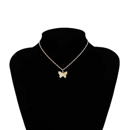 Vintage Metallic Gold Chain Butterfly Pendant..