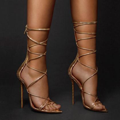 Pointed Golden Roman Cross Strapped Boots With..