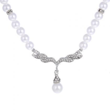 Two Piece Set Of Alloy Inlaid Diamond Pearl..