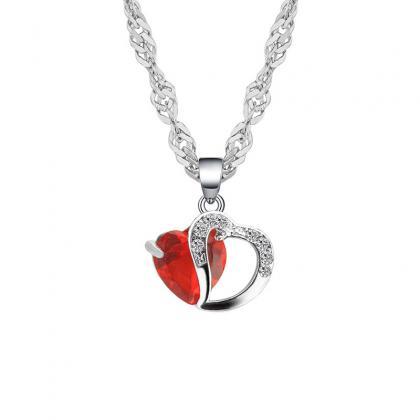 Red Peach Heart Shaped Zircon Crystal Necklace..