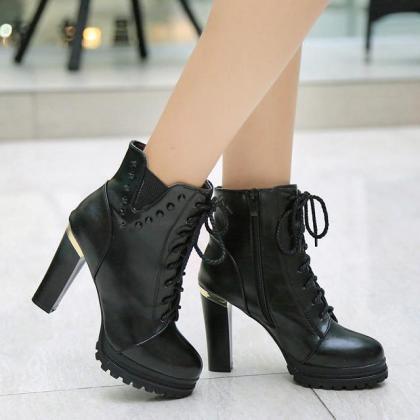 Patent Leather Chunky High Heel Boots With Studs..