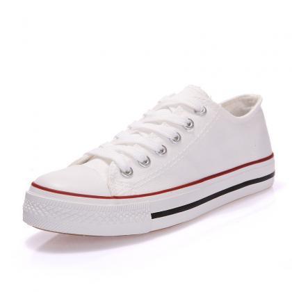 Classic Canvas Sneakers With Bold Stitching And..